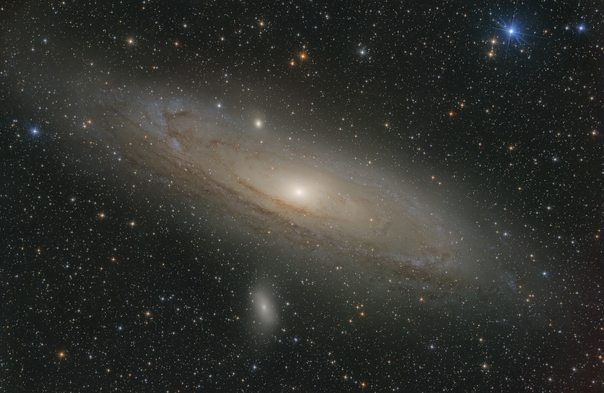 The Andromeda Galaxy, Messier 31, is the closest spiral galaxy to our Milky Way, around 2.5 million light-years away. It is located in the eponymous constellation Andromeda and is the most distant object that can be observed with the naked eye under good conditions without technical aids. The small galaxy to the left below Andromeda is Messier 110.